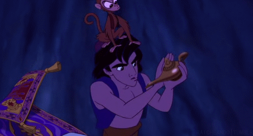 Aladdin rubbing magic lamp